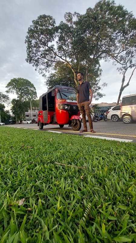 Our red tuk tuk on a Colombo outing — photograph 6