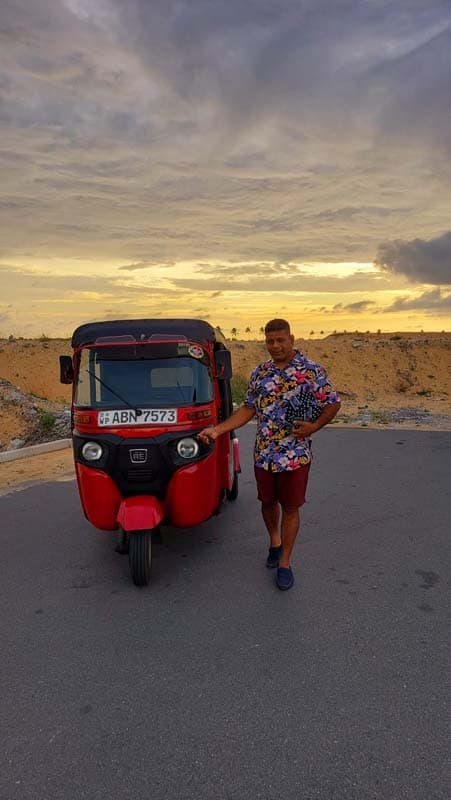 Our red tuk tuk on a Colombo outing — photograph 2